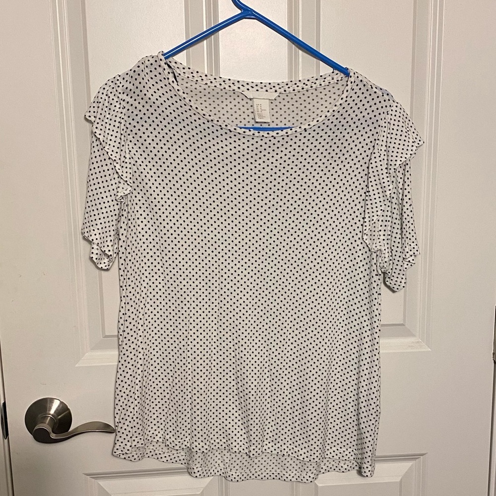 White and black polkadots with ruffles on shoulder